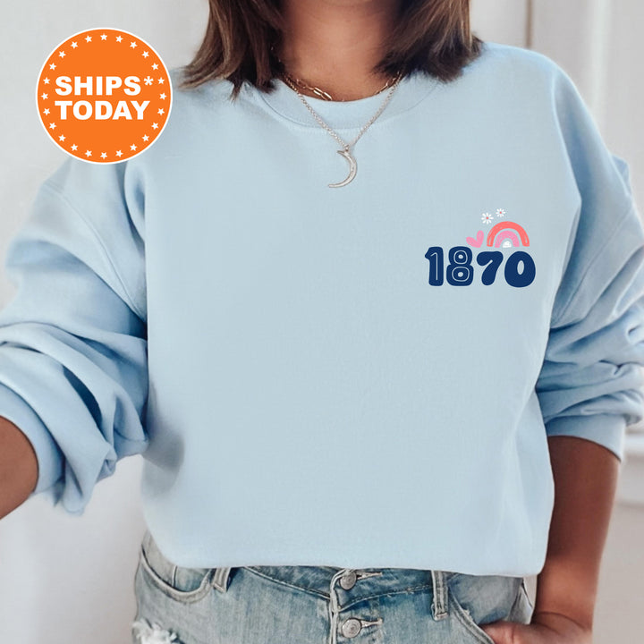 a woman wearing a blue sweatshirt with the words 1970 printed on it