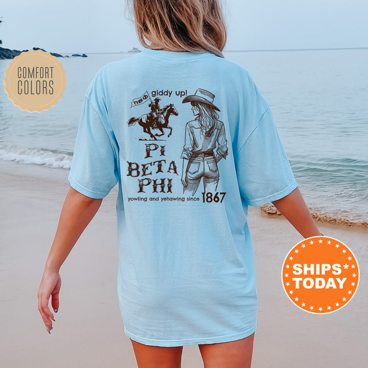 a woman walking on the beach with a horse t - shirt