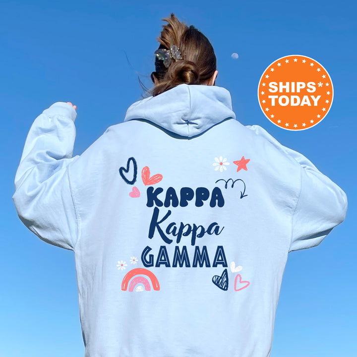 a woman wearing a white hoodie with the words kappa kappa