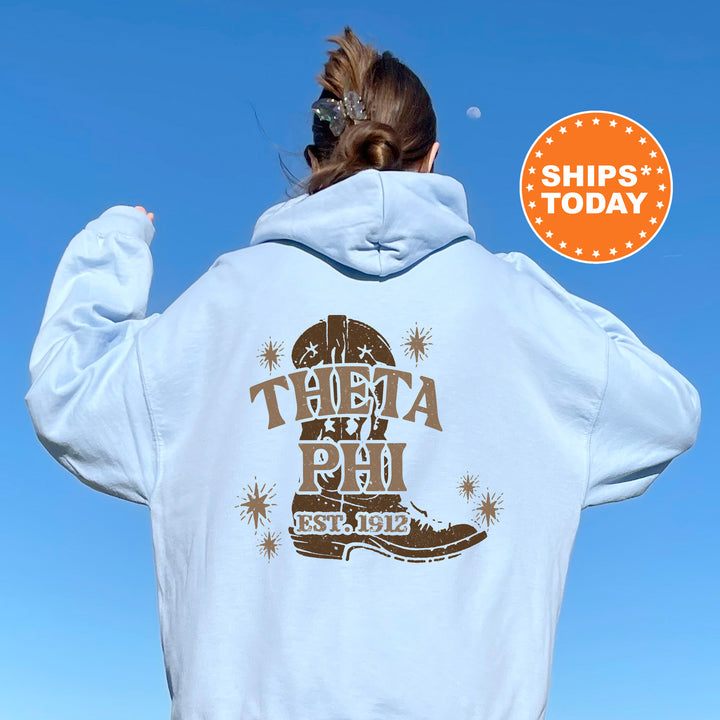 a woman wearing a white hoodie with the words there's a phl