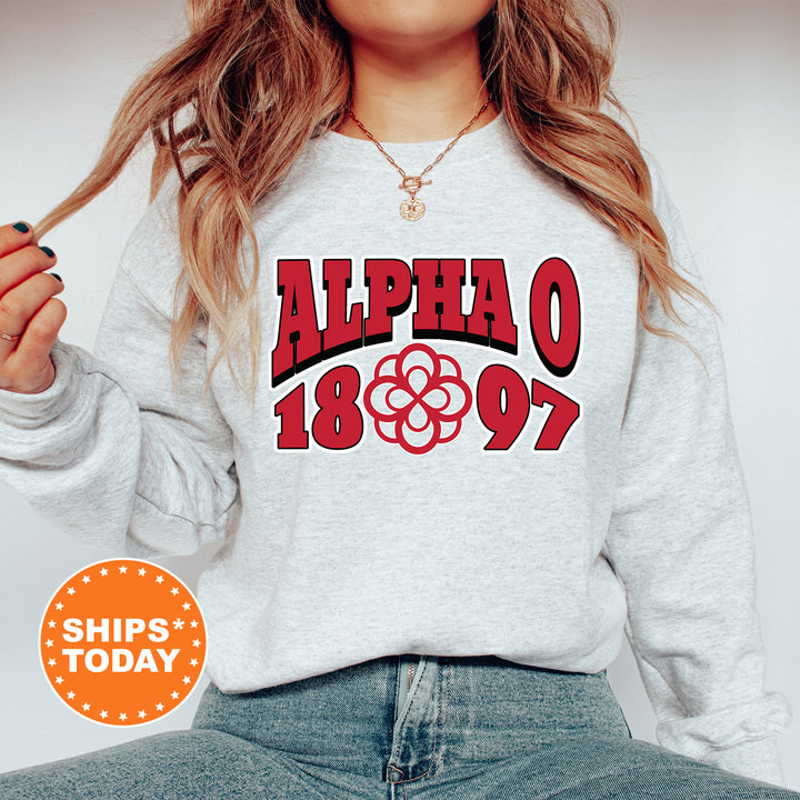 a woman wearing a sweatshirt with the words alphao on it