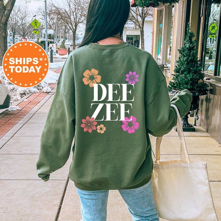 a woman walking down a sidewalk carrying a shopping bag