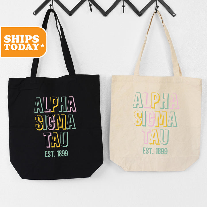 two totes hanging on a wall next to each other