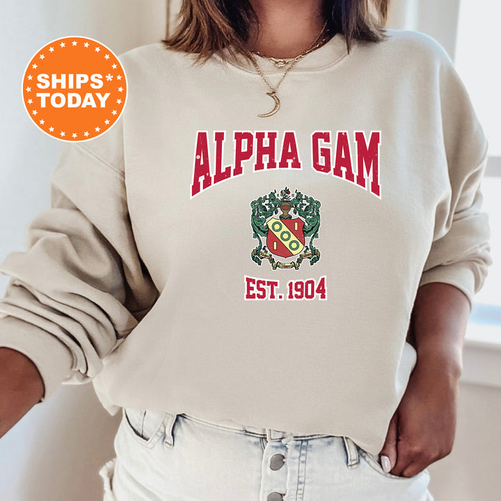 a woman wearing a sweatshirt with a crest on it