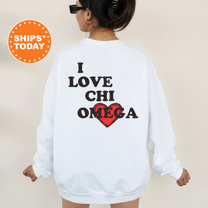a woman wearing a white sweatshirt with the words i love chili on it