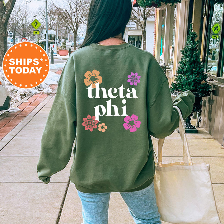 a woman walking down a sidewalk carrying a shopping bag