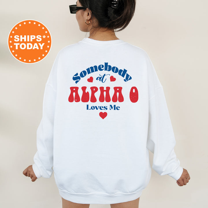 a woman wearing a sweatshirt that says somebody at birth loves me
