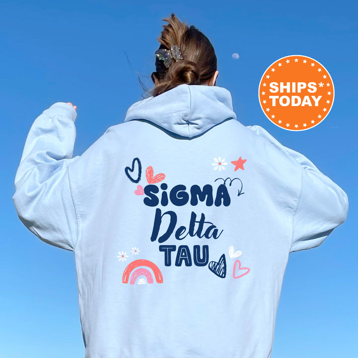 a woman with her back to the camera wearing a white hoodie