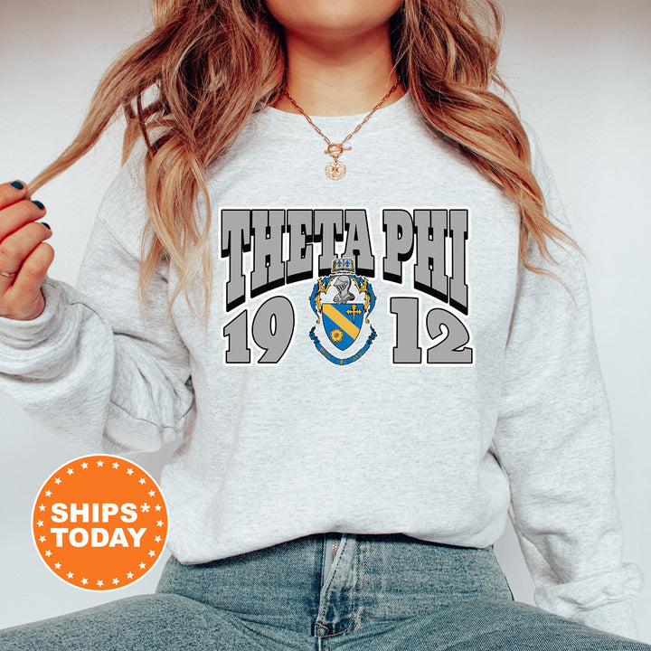 a woman wearing a sweatshirt with the logo of a soccer team