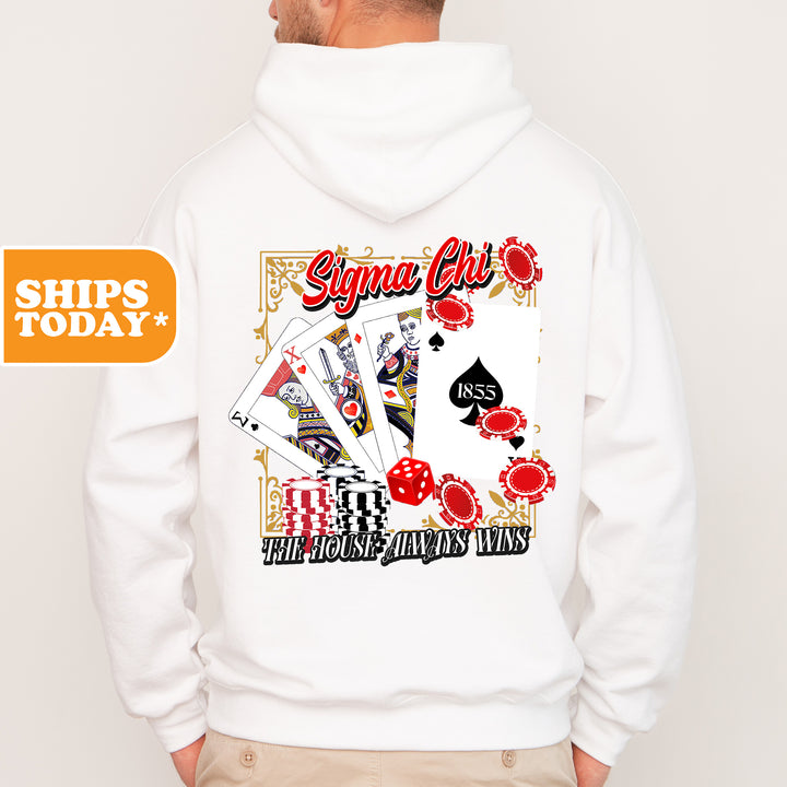 a man wearing a white hoodie with a picture of a playing card on it