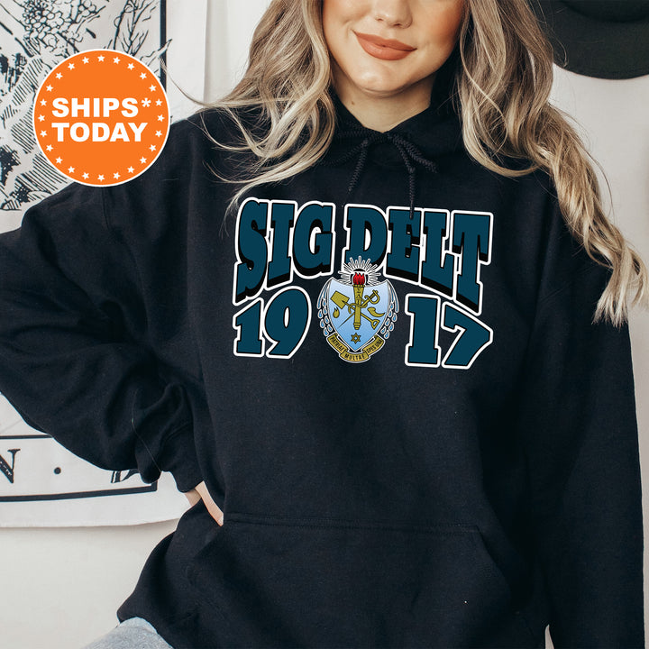 a woman wearing a black hoodie with the words support 911 on it