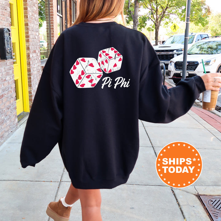 a woman walking down a sidewalk wearing a sweatshirt