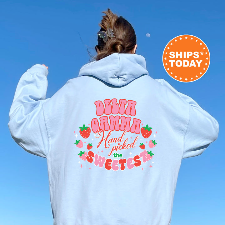 a woman wearing a white hoodie that says dear mama and i picked the sweet