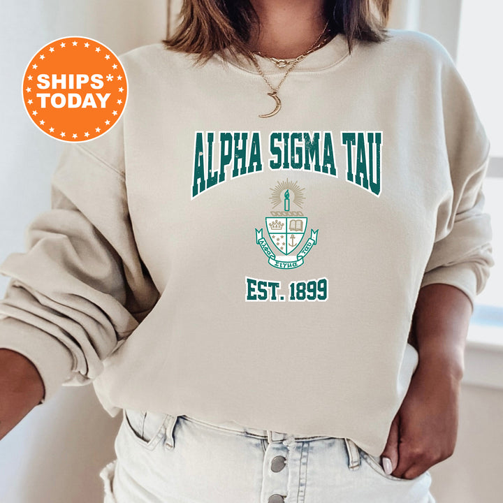 a woman wearing a sweatshirt that says aloha stigma tau