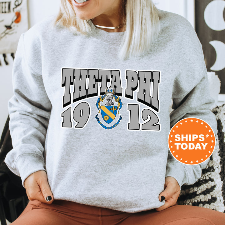 a woman wearing a sweatshirt with the phi phi 2012 on it