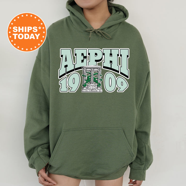 a person wearing a green hoodie with the words aephh on it