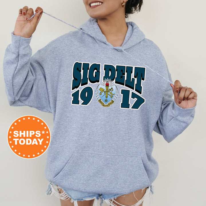 a woman wearing a blue hoodie with the words ship's today on it