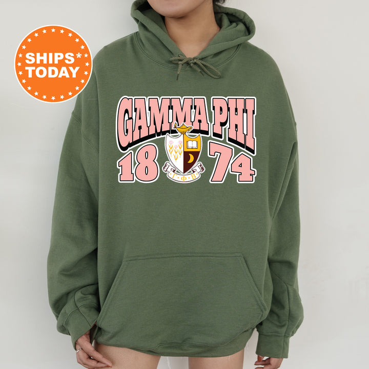 a woman wearing a green hoodie with the words game phi on it