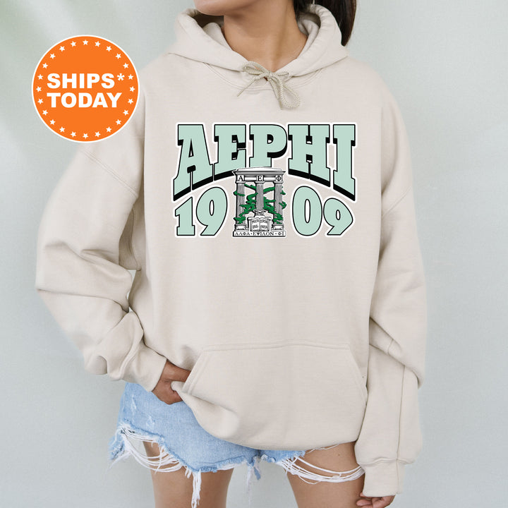 a woman wearing a white hoodie with the words aphil on it