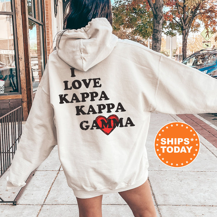 a woman in a white hoodie that says i love kapa kapa ga
