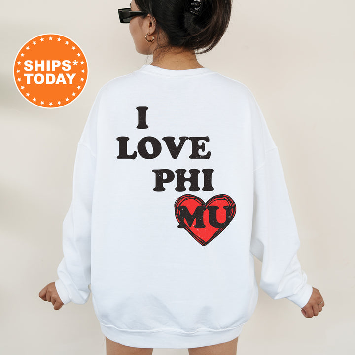 a woman wearing a sweatshirt that says i love phi