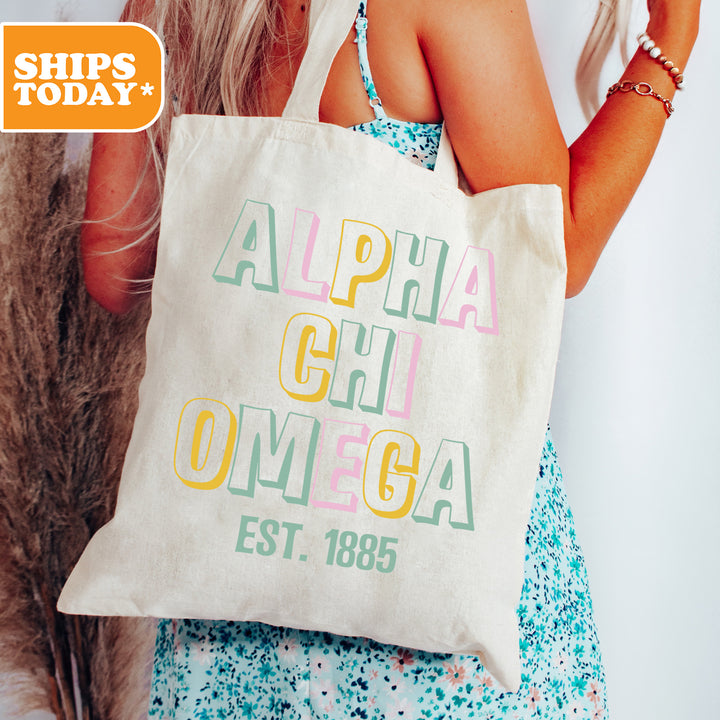 a woman holding a white bag with the words alpa gli omega