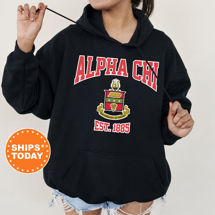 a woman wearing a black hoodie with a cup of coffee on it