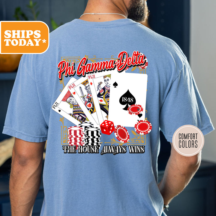 a man wearing a blue shirt with a picture of a deck of cards