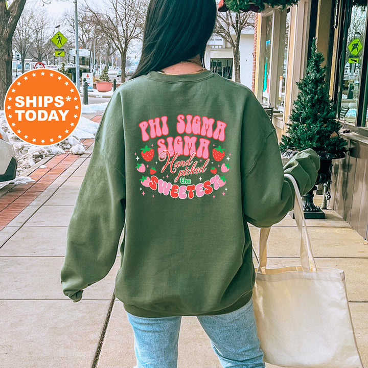 a woman walking down a sidewalk carrying a shopping bag