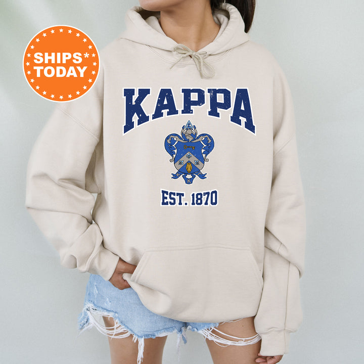 a woman wearing a sweatshirt with the words kappa on it