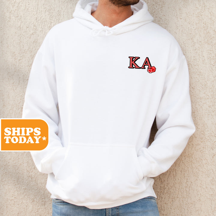 a man wearing a white hoodie with the letters ka on it