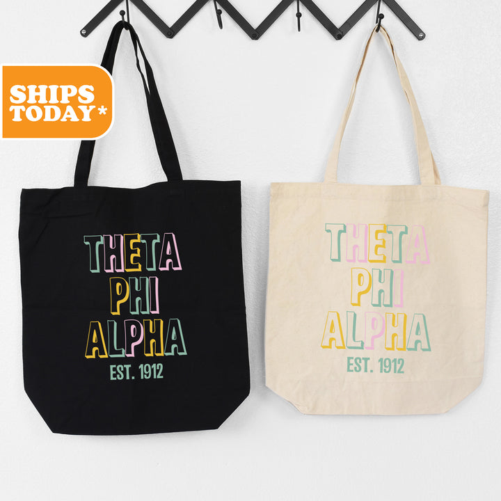 two totes hanging on a wall next to each other