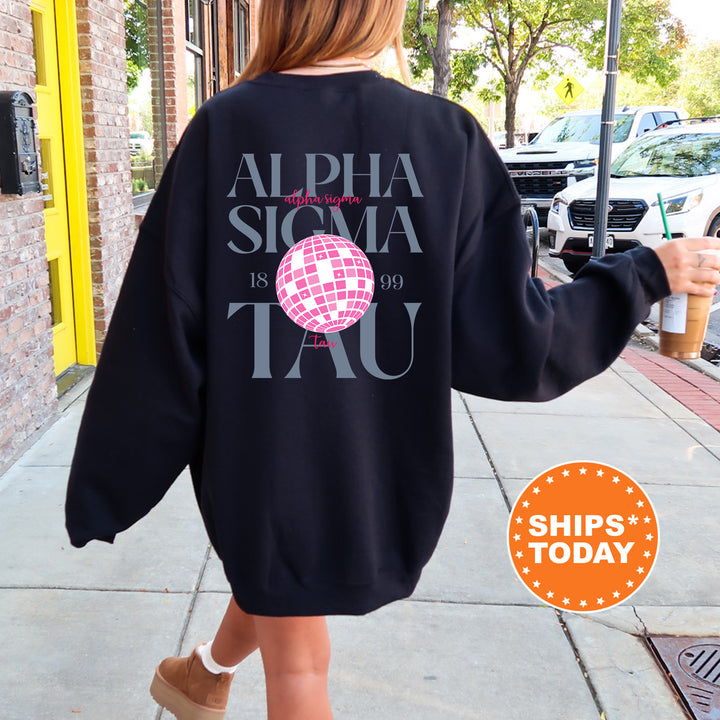 a woman walking down a sidewalk holding an umbrella