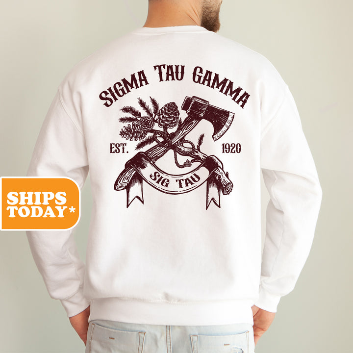 a man wearing a white sweatshirt with a gun on it