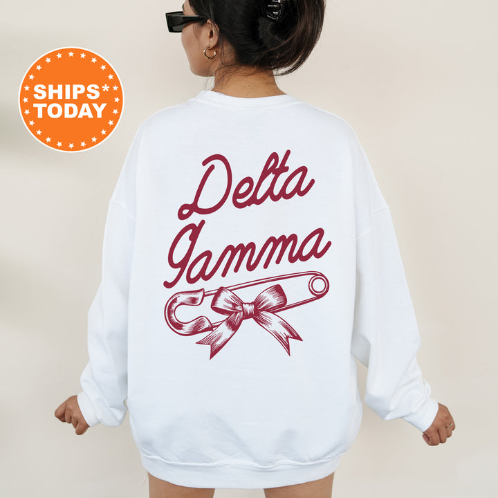 a woman wearing a sweatshirt that says delta garma