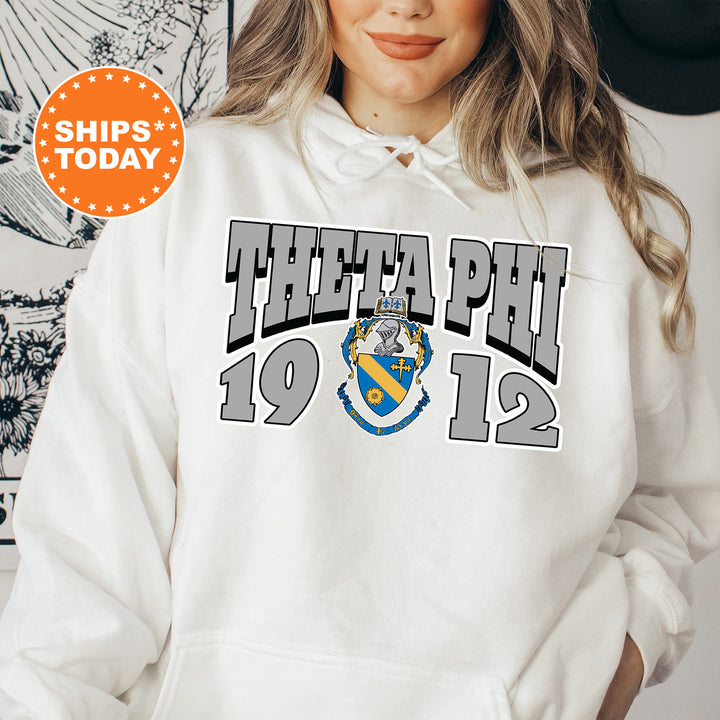 a woman wearing a white hoodie with the phi phi phi phi phi phi phi