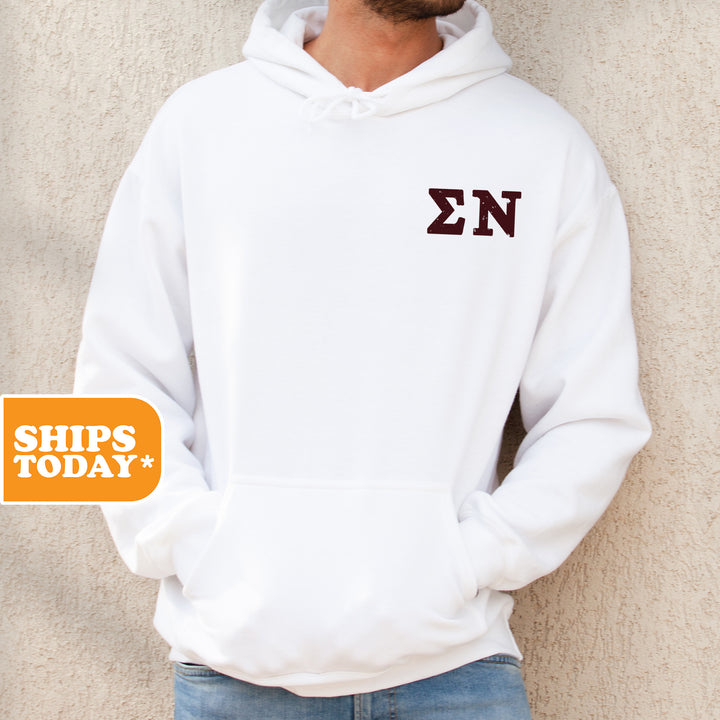 a man wearing a white hoodie with the letters zn on it
