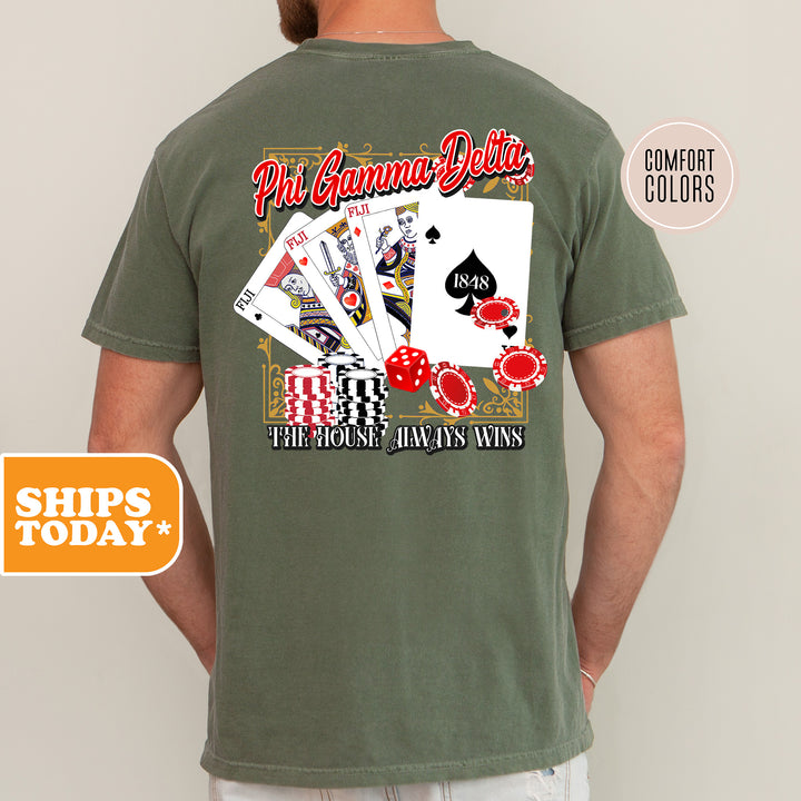 a man wearing a t - shirt with a picture of playing cards