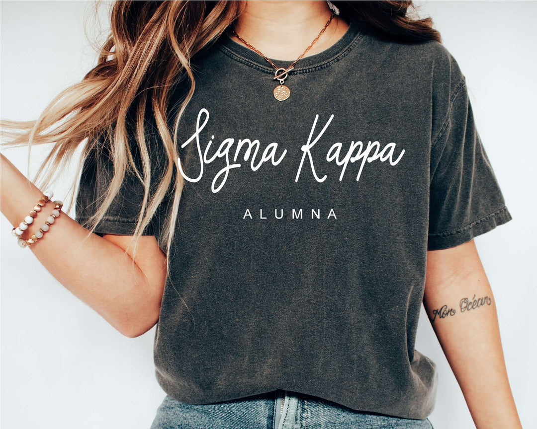 a woman wearing a black shirt with a name on it