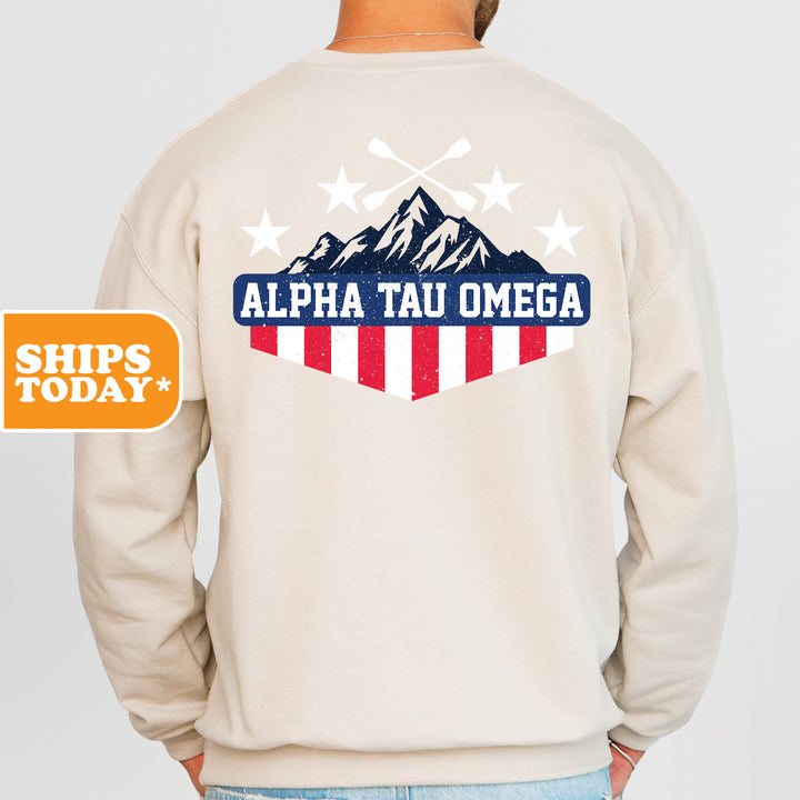 the back of a man wearing a sweatshirt with an american flag on it
