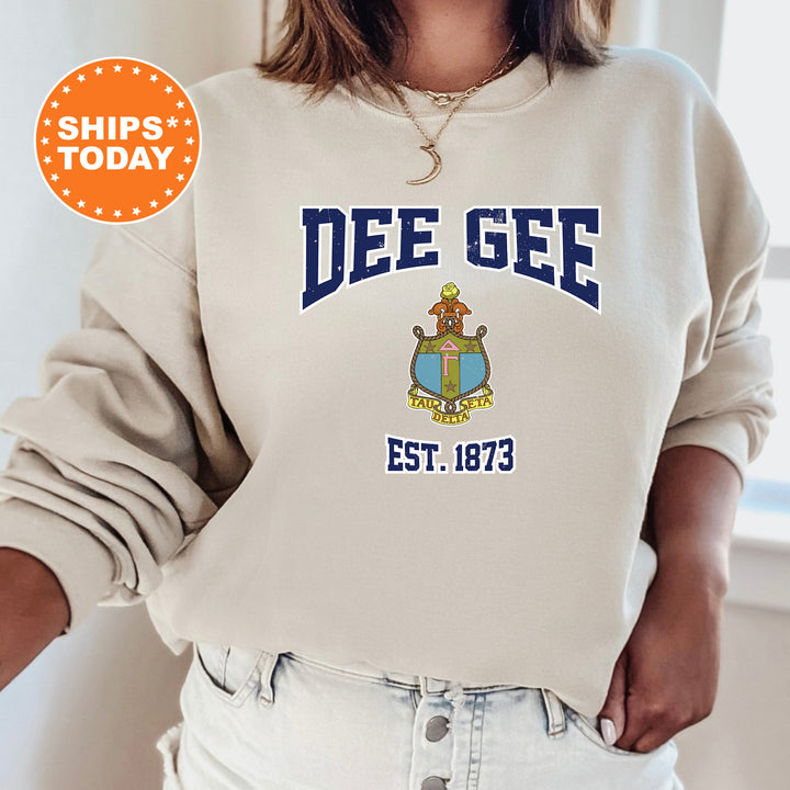 a woman wearing a sweatshirt that says dee gee est 1876