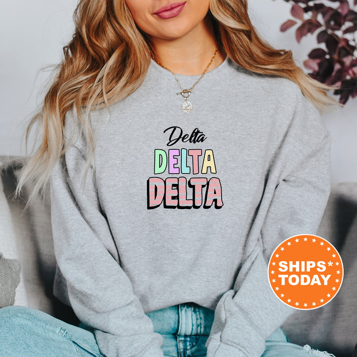 a woman wearing a sweatshirt that says delta delta