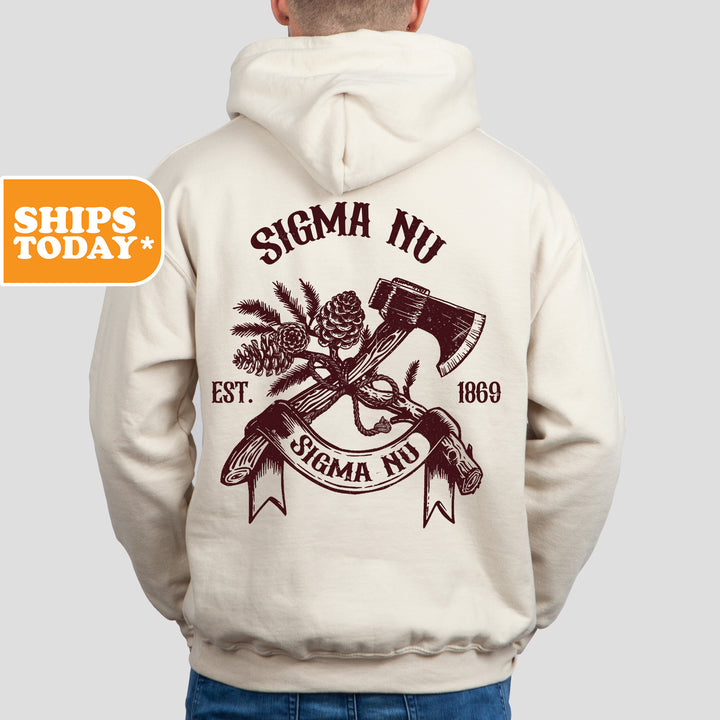 a man wearing a white hoodie with an image of a hammer and a pine