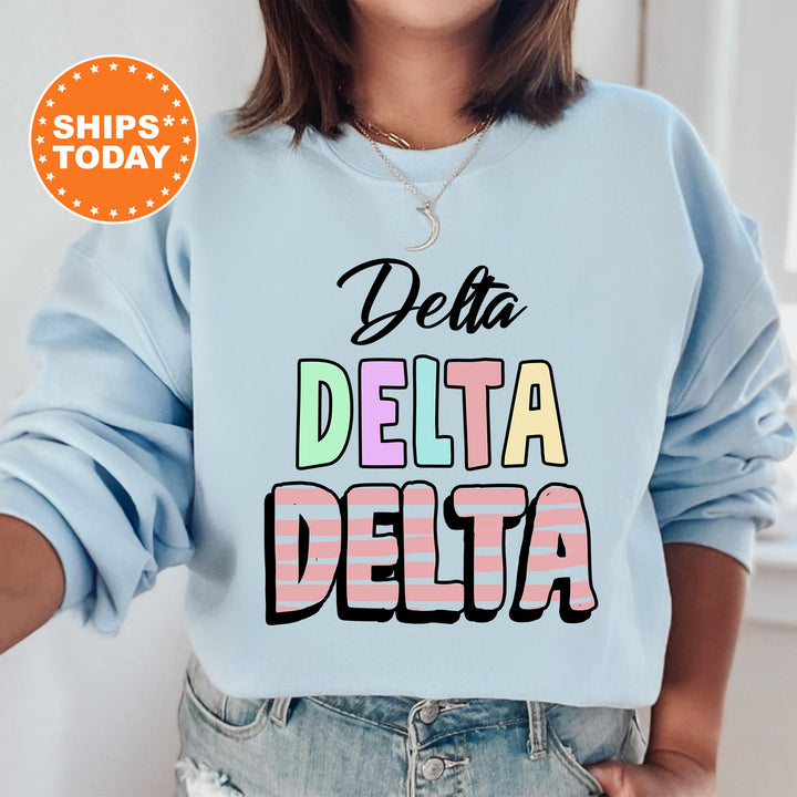 a woman wearing a sweatshirt that says delta delta