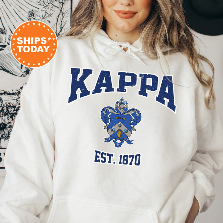 a woman wearing a white kappa hoodie