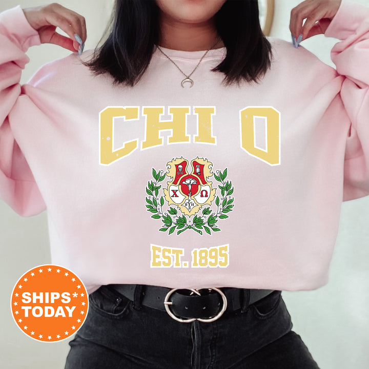 a woman wearing a pink sweatshirt with the words chio on it