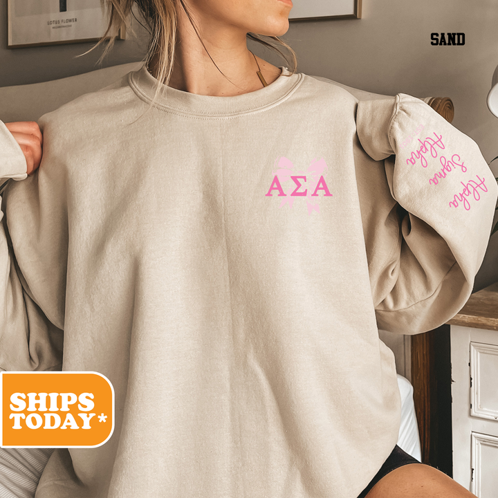 a woman wearing a sweatshirt with pink letters on it
