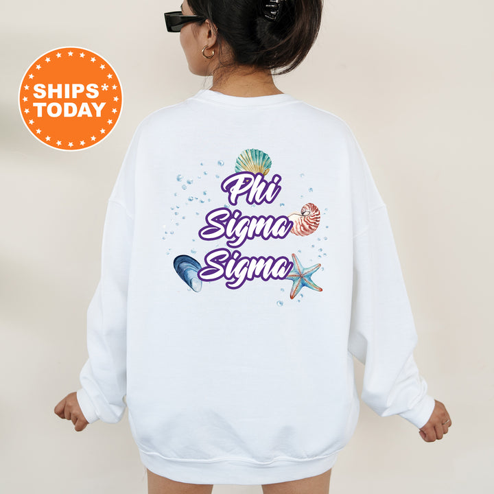 a woman wearing a white sweatshirt with the words phi sima sima on it
