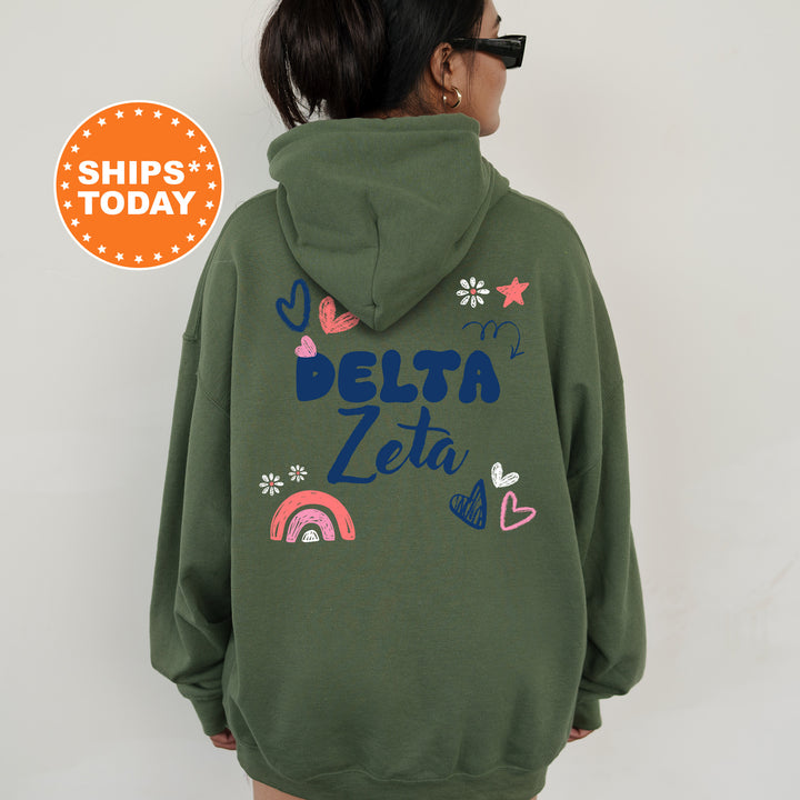 a woman wearing a green hoodie with the word delta on it