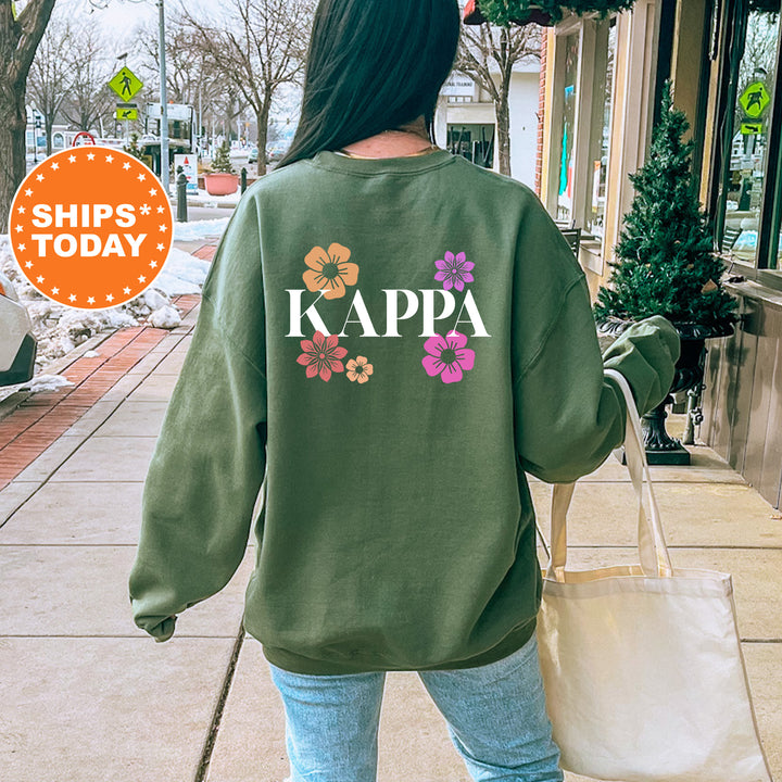 a woman walking down a sidewalk carrying a bag